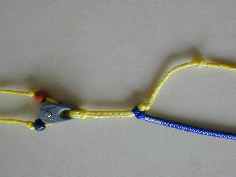 http://www.paraflysurf.ch/Depower-Pulley.JPG